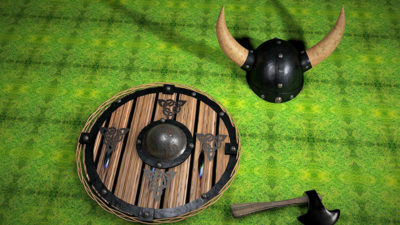 En runt träsköld, en metallhatt med två horn som pekar ut åt sidorna och en liten yxa.