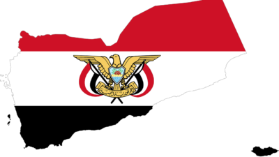 En kontur av landet Jemen. Konturen är fylld av Yemens flagga som består av tre ränder i rött, vitt och svart. På flaggan är en stor symbol med en örn.