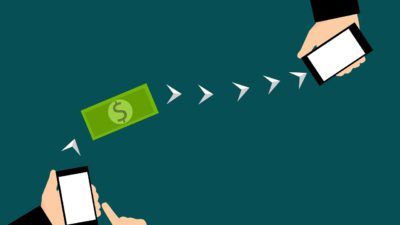 Tecknad bild på två mobiltelefoner som skickar en dollarsedel mellan varandra.