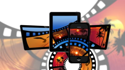 Olika skärmar i olika storlekar med motiv av filmrullar på dem